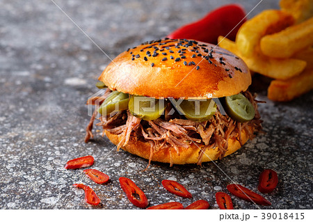 Fresh juicy delicious homemade burger. Fresh juicy delicious homemade burger. 39018415