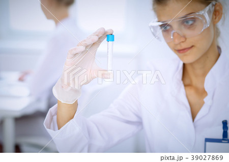 Female scientific researcher in laboratory Female scientific researcher in laboratory 39027869