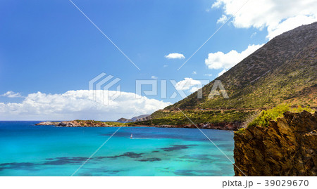 Windsurf with red sail. Water sports on vacations 39029670