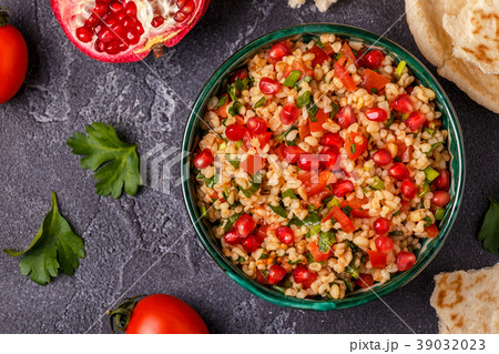 Tabbouleh salad, traditional middle eastern dish. Tabbouleh salad, traditional middle eastern dish. 39032023