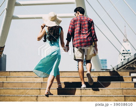 Couple Asian travelers enjoying vacations in city Couple Asian travelers enjoying vacations in city 39038610