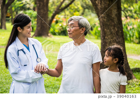 Young female doctor talking to senior patient Young female doctor talking to senior patient 39040163