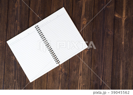 Notebook or empty white paper on wood table 39045562