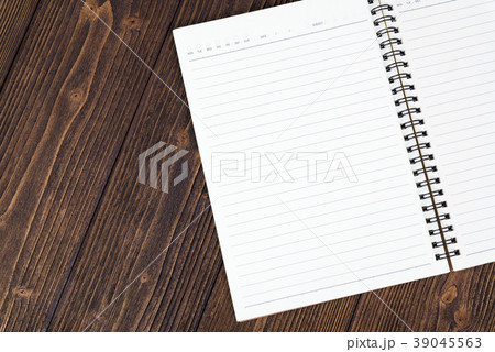 Notebook or empty white paper on wood table 39045563