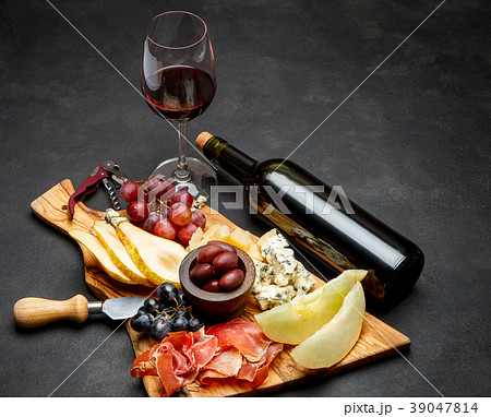 Meat plate antipasti snack - Prosciutto ham, blue 39047814