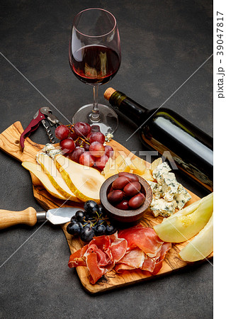 Meat plate antipasti snack - Prosciutto ham, blue 39047817