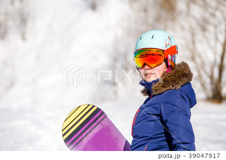 Portrait of sporty woman wearing helmet with 39047917