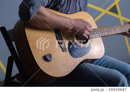 guitar in the hands 39049687