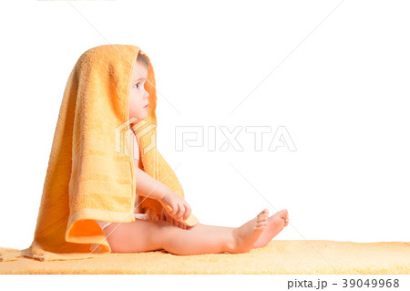 Little girl wrapped in yellow towel, isolated on Little girl wrapped in yellow towel, isolated on 39049968