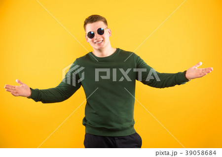 Portrait of young happy handsome smiling guy with 39058684