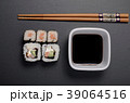 sushi rolls with soy and chopsticks 39064516