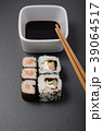 sushi rolls with soy and chopsticks 39064517