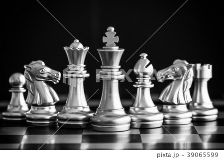 The King in battle chess game stand on chessboard The King in battle chess game stand on chessboard 39065599