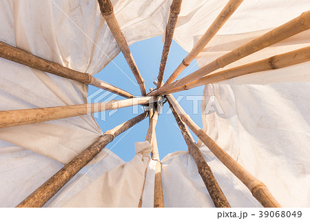 Look up in sky inside Native American Indian tepee 39068049