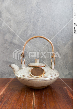 Chinese tea pot on wooden table. Copy space 39068086