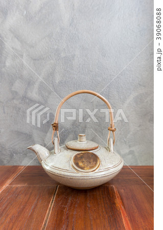 Chinese tea pot on wooden table. Copy space 39068088