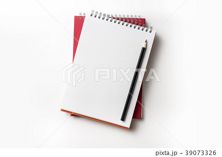 Top view of spiral notebook and color pencil Top view of spiral notebook and color pencil 39073326