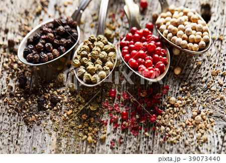Peppers on wooden background 39073440