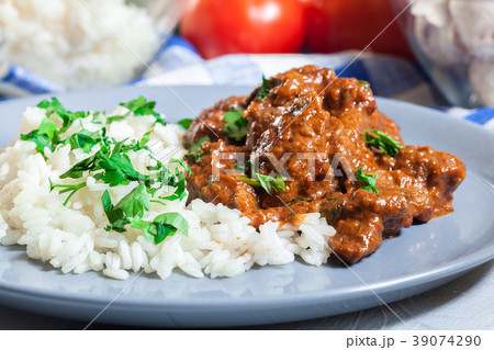 Beef Stroganoff served with rice 39074290