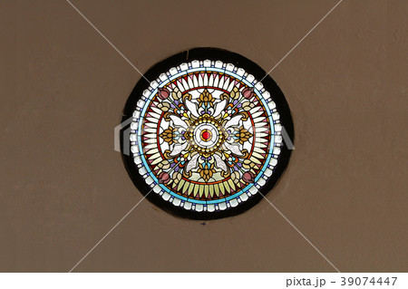 Church stained glass window brown concrete wall 39074447