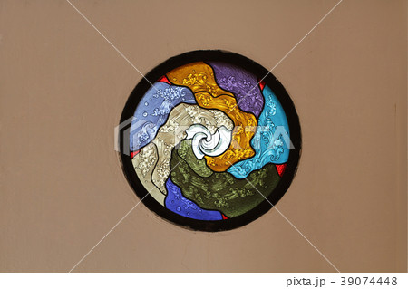 Church stained glass window brown concrete wall 39074448