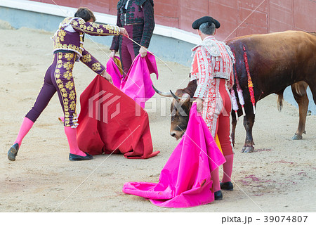 Corrida. Fighting in a typical Spanish Bullfight Corrida. Fighting in a typical Spanish Bullfight 39074807
