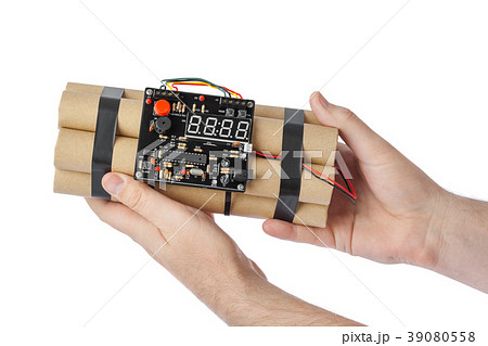 Hand with dynamite stick Hand with dynamite stick 39080558