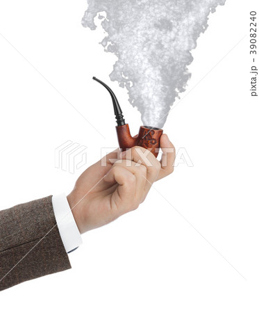 Hand with smoking pipe Hand with smoking pipe 39082240