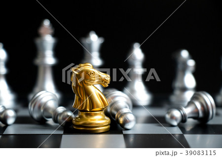 Gold horse in chess game face with another silver Gold horse in chess game face with another silver 39083115