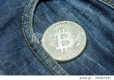Bit coin in the pocket of black jeans 39084445