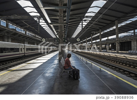 Spain, Andalusia, Cordoba, Woman on empty train platform 39088936