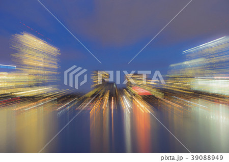 Light trails from city skyline at dusk 39088949