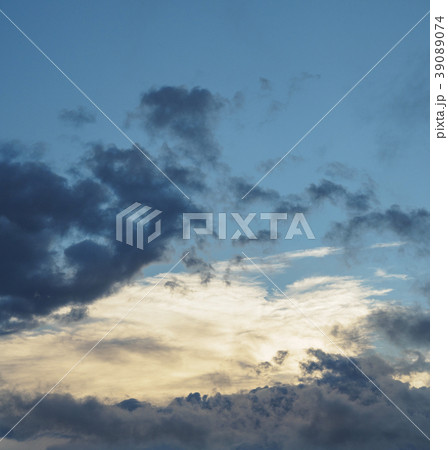 Blue sky with storm clouds at sunset 39089074