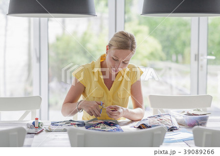 Woman making quilt Woman making quilt 39089266