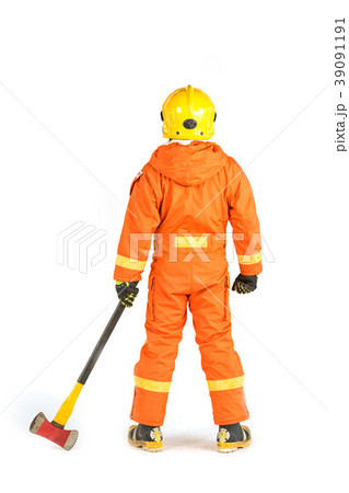 Firefighter in uniform and safety helmet standing 39091191