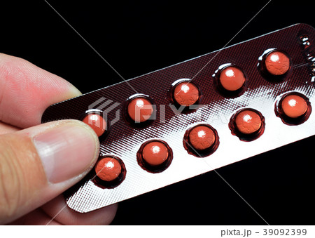 Packs of medicine on black background. Packs of medicine on black background. 39092399