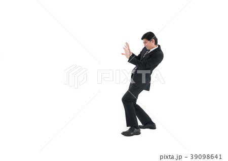 ビジネス、押す　堪える　圧力　プレッシャー 39098641