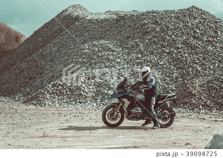 Motorcyclist riding on the modern motorbike 39098725