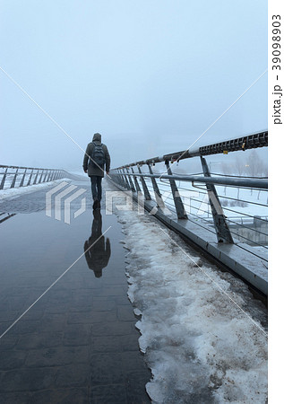 Person silhouette obscure in dense fog 39098903