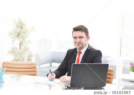 Young employee looking at computer monitor during 39102987
