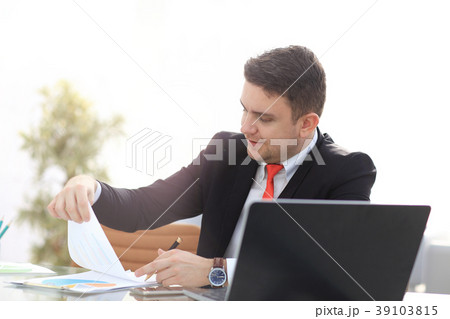 Young employee looking at computer monitor during 39103815