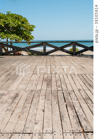 wooden terrace with beach, ocean and blue sky  39105914