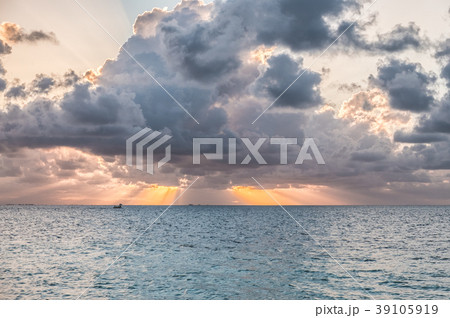 sunset sky during over water - scenic ocean 39105919