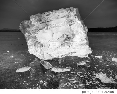 Blocks of shining ice and snow on the shore Blocks of shining ice and snow on the shore 39106406