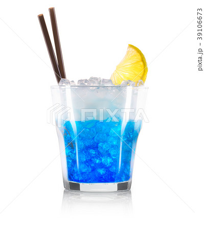 Blue curacao cocktail with lime and black straw Blue curacao cocktail with lime and black straw 39106673