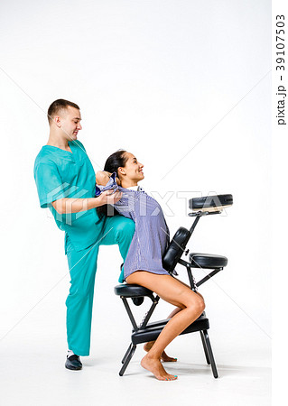 Theme massage and office. young male therapist in Theme massage and office. young male therapist in 39107503