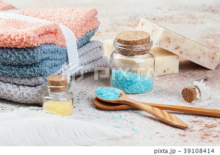 Bath salts in glass bottles,wooden spoon 39108414
