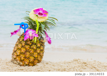 Purple orchid flower put on Fresh pineapple juice  39114033