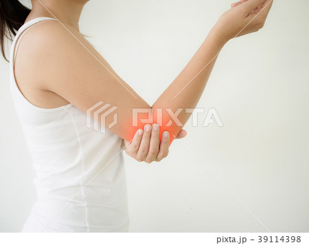 Close up woman having pain in injured elbow.  39114398