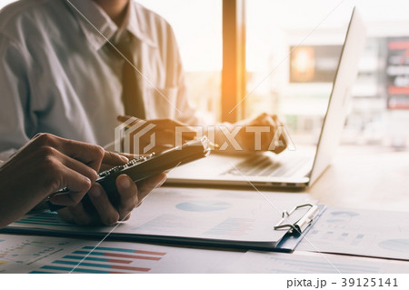 Close up businessman calculate about cost 39125141